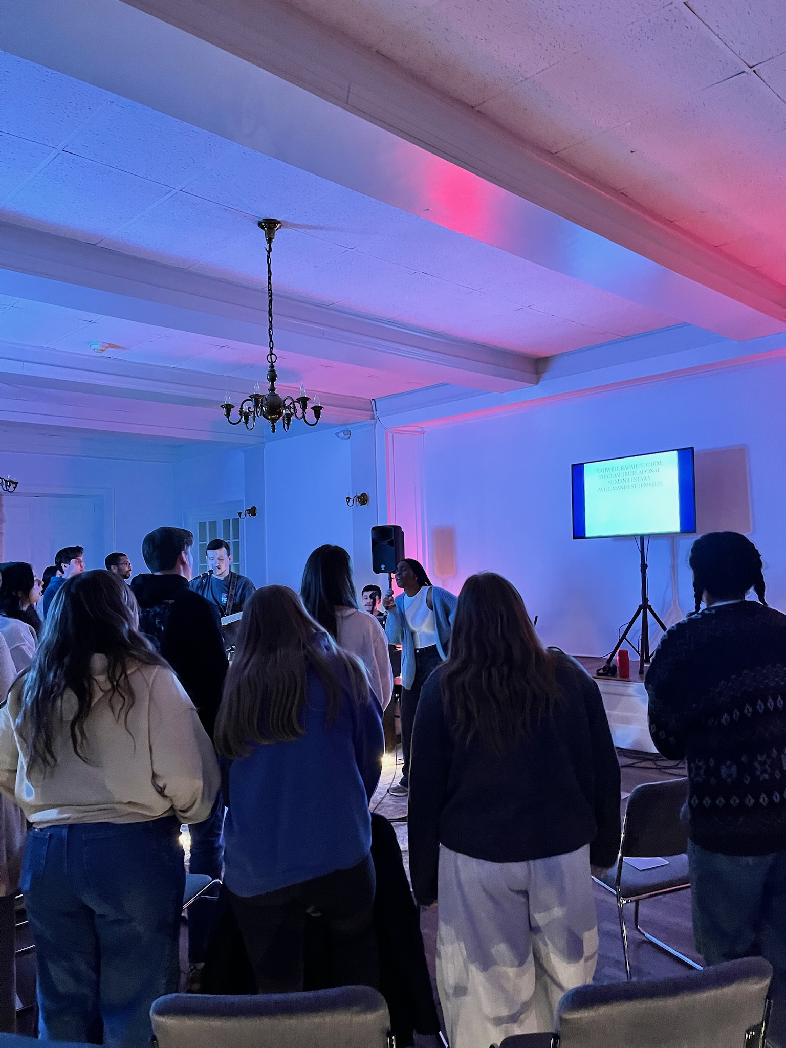 People gathered in worship at the Apple of My Eye event